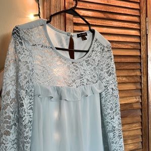 A light blue shirt or a short dress, with long lace sleeves, AS U WISH, size M